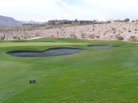 The black sand in the picture can be seen on Bear's Best Golf Course in Las Vegas and is a replica of a golfing hole from Jack Nicklaus's 'Old Works' in Montana.