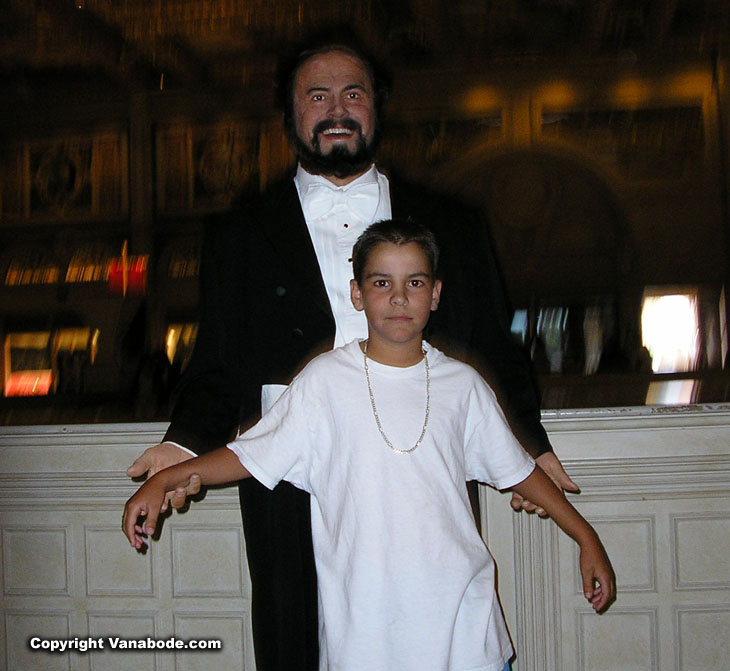 picture of ben posing with pavarotti in las vegas