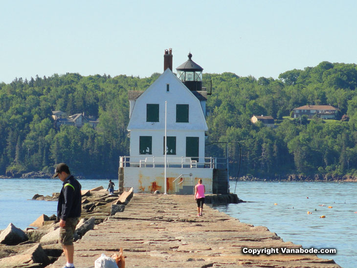 lighthouse on the breakwater in maine